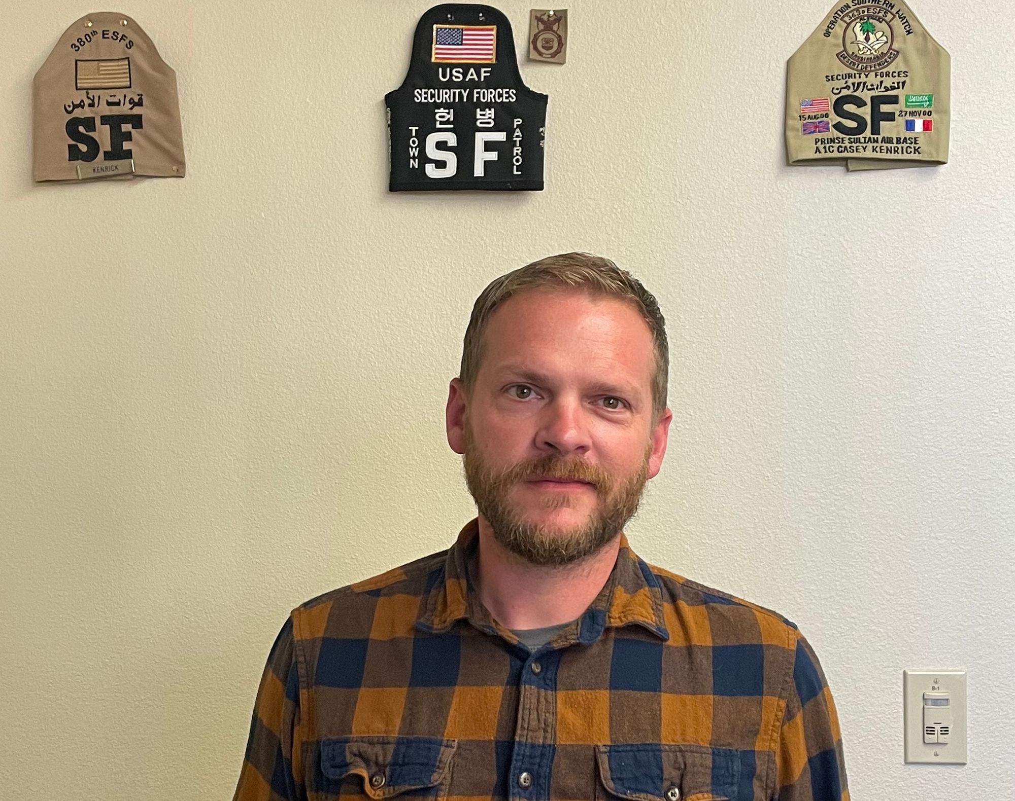 Air Force veteran Casey Kenrick pictured with Air Force memorabilia