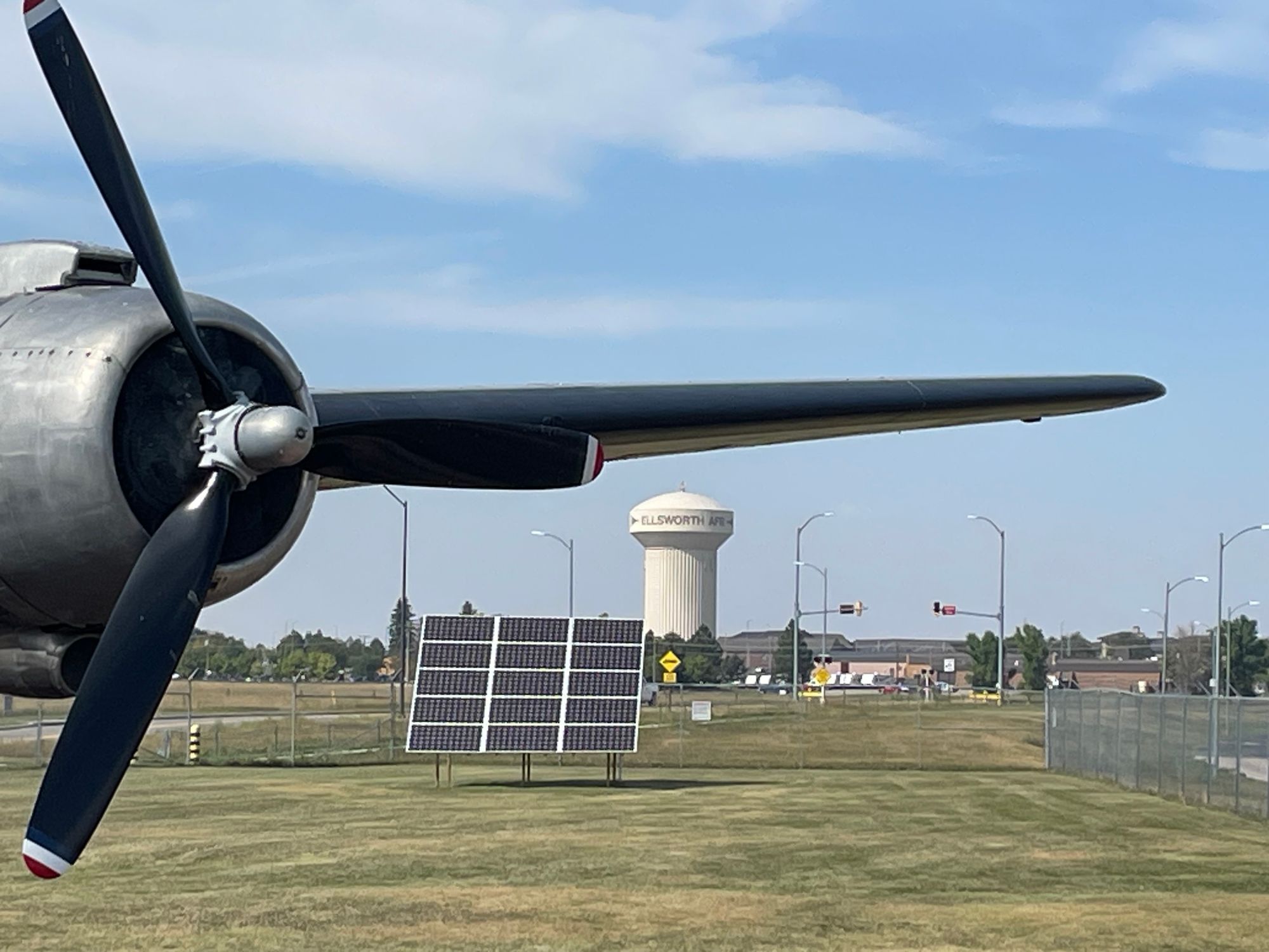 Ellsworth Air Force base museum in the foreground with a water town in the background