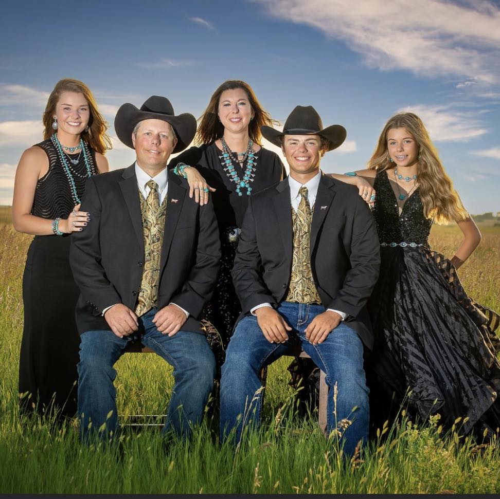 Troy Hadrick, second from left, poses for a portrait with his wife and three children, who are all part of a multi-generational farm and ranch legacy in South Dakota. The family -- Olivia, Troy, Stacy, Teigen and Reese -- is working as a team to build a meat processing plant near their home in Faulkton, S.D.
