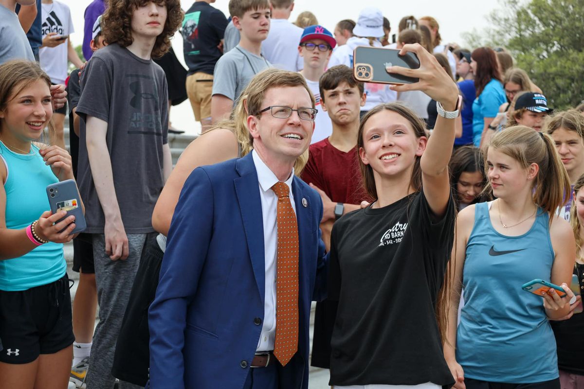 South Dakota Rep. Dusty Johnson takes a selfie with a constituent