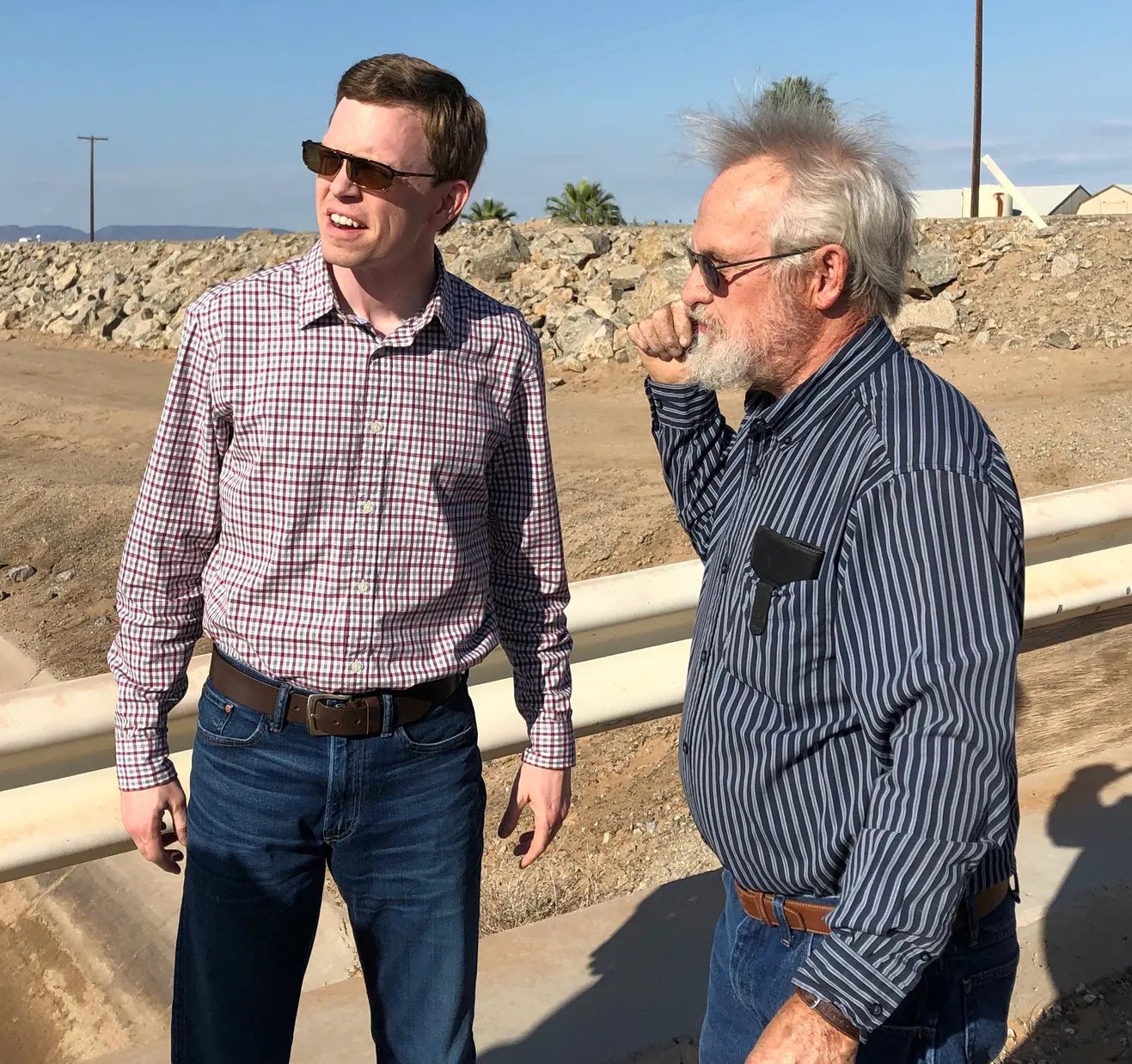 Rep. Dusty Johnson talks to a landowner near the U.S.-Mexico border.