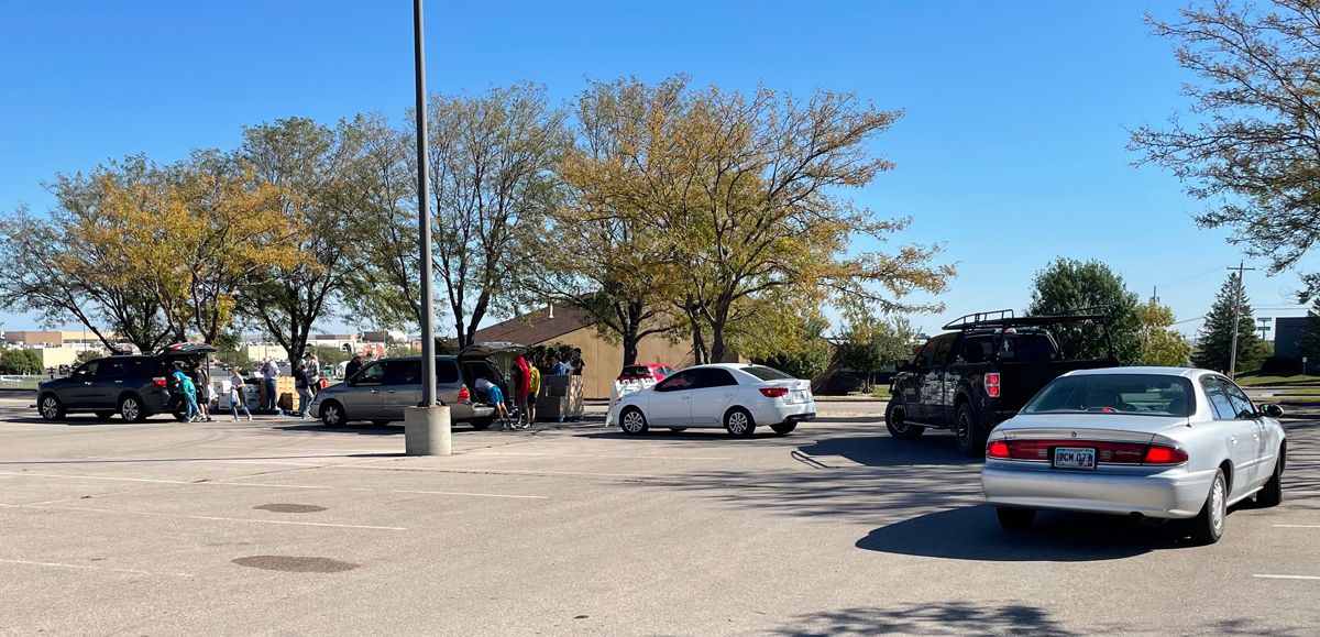 Cars line up to get food at a food bank in Rapid City, South Dakota.