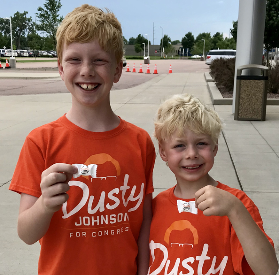 Dusty Johnson's sons, Ben (left) and Owen, handing out campaign mints