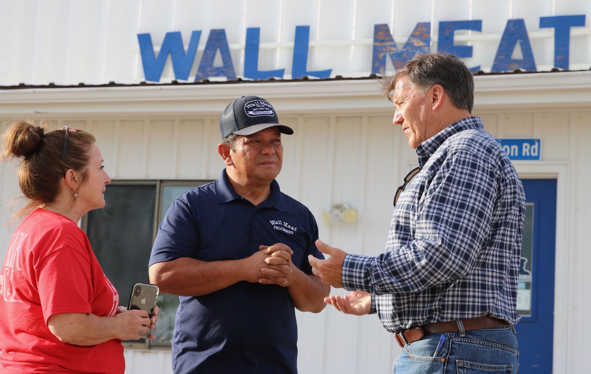 South Dakota U.S. Sen. Mike Rounds meetst with Wall Meat Processing co-owners Janet Niehaus and Ken Charfauros during a recent visit.