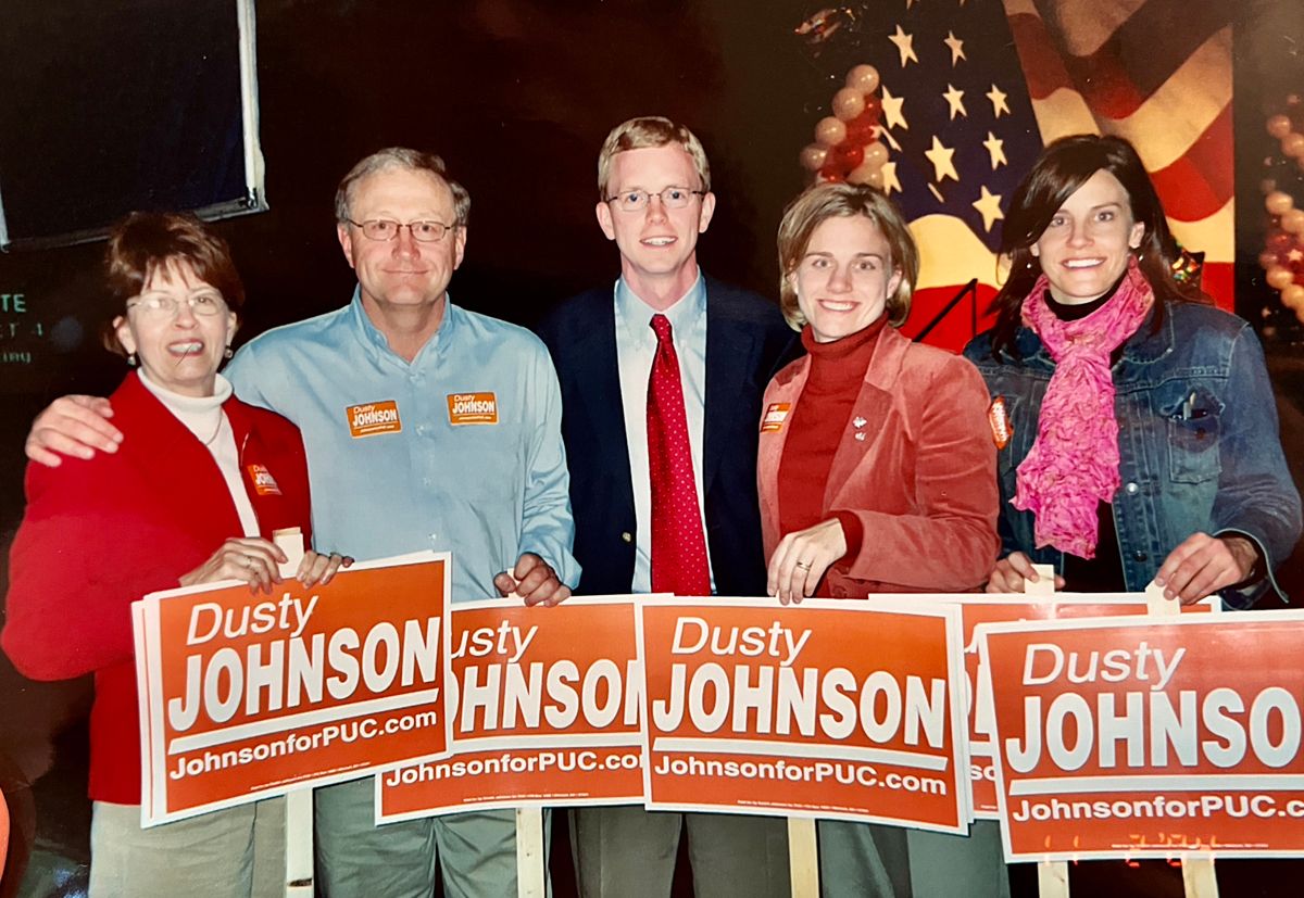Dusty Johnson poses with wife Jacquelyn (second from right) and her family after being elected Public Utilities Commissioner