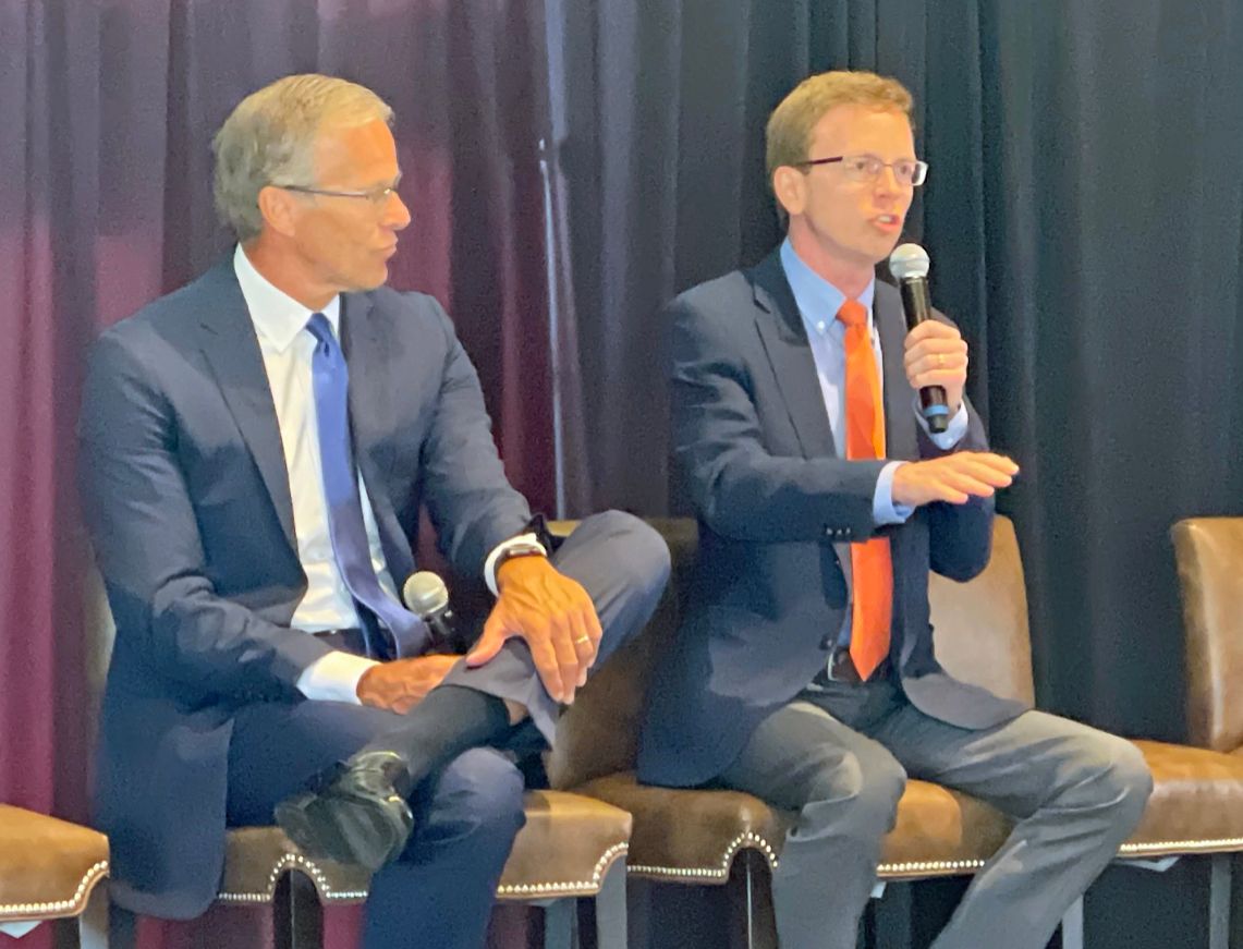 Rep. Dusty Johnson appears alongside Sen. John Thune
