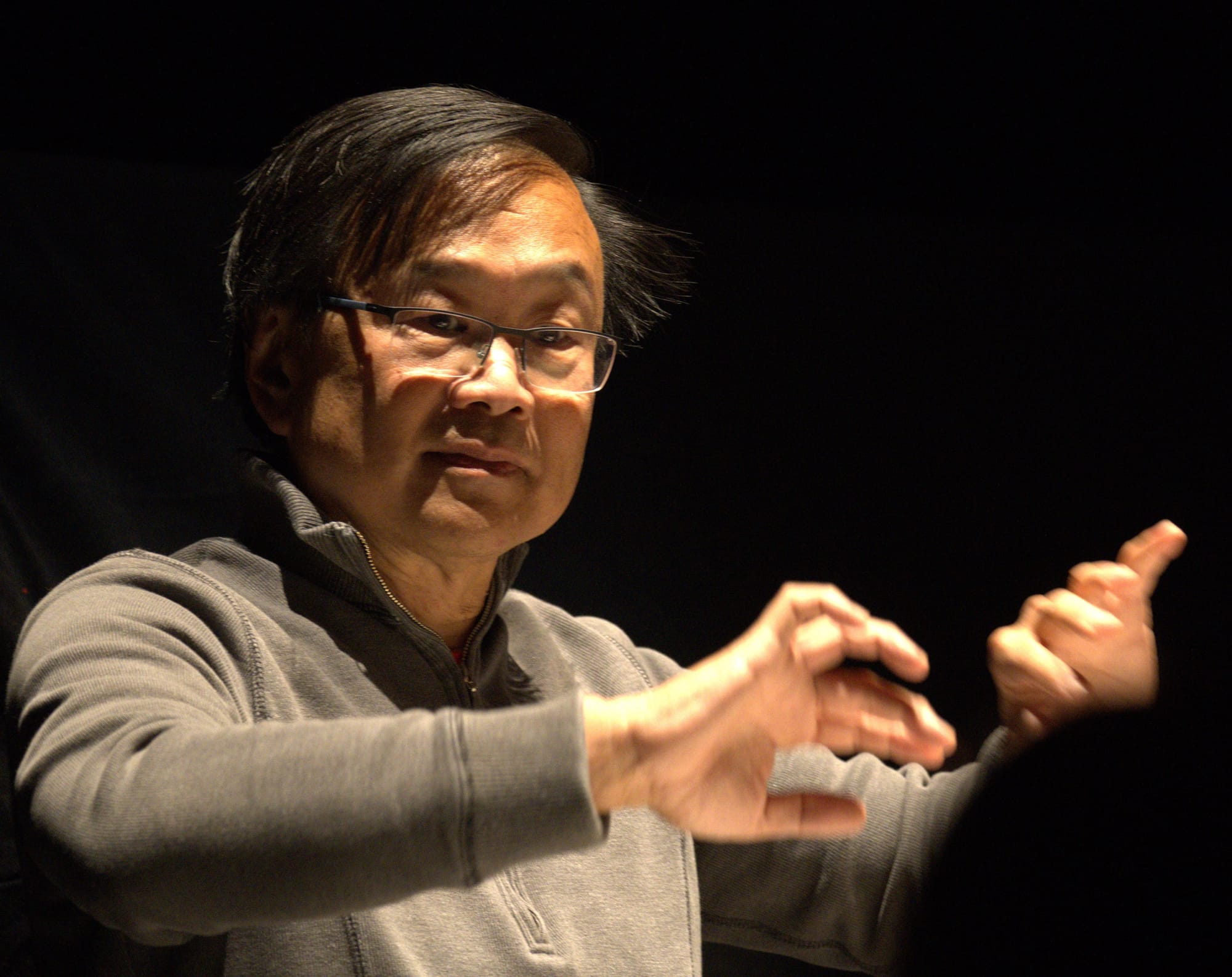 Michael Ching conducts an opera