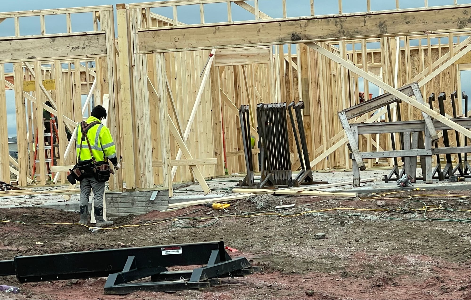 A worker at a home construction site.