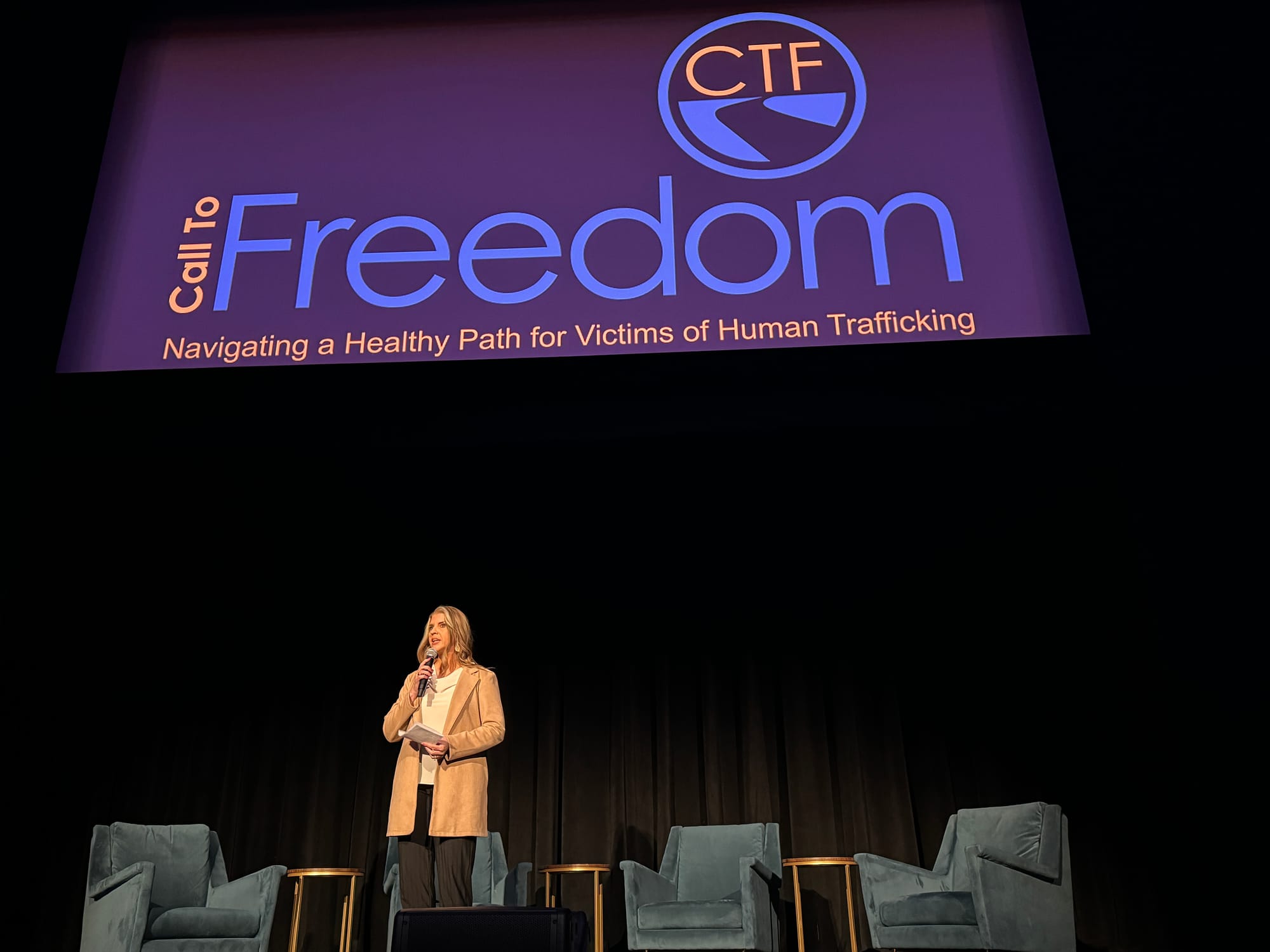 Call to Freedom CEO Becky Rasmussen speaks at an event on human trafficking