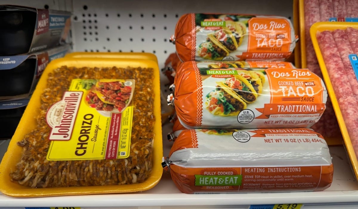 Packaged meat on a grocery store shelf.
