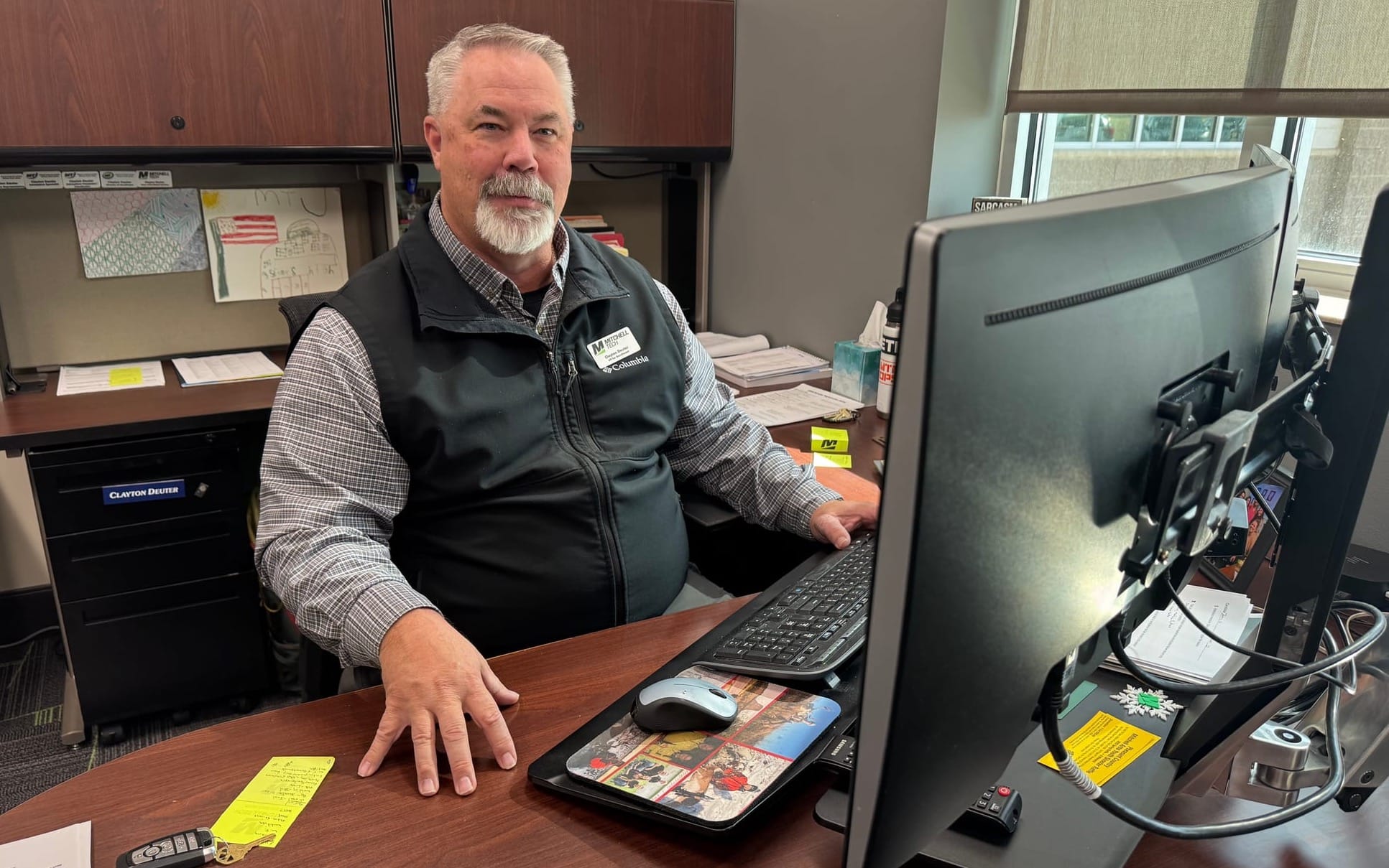 Clayton Deuter, vice president for enrollment services, sits at his desk at Mitchell Tech in Mitchell, S.D., on April 8, 2025.