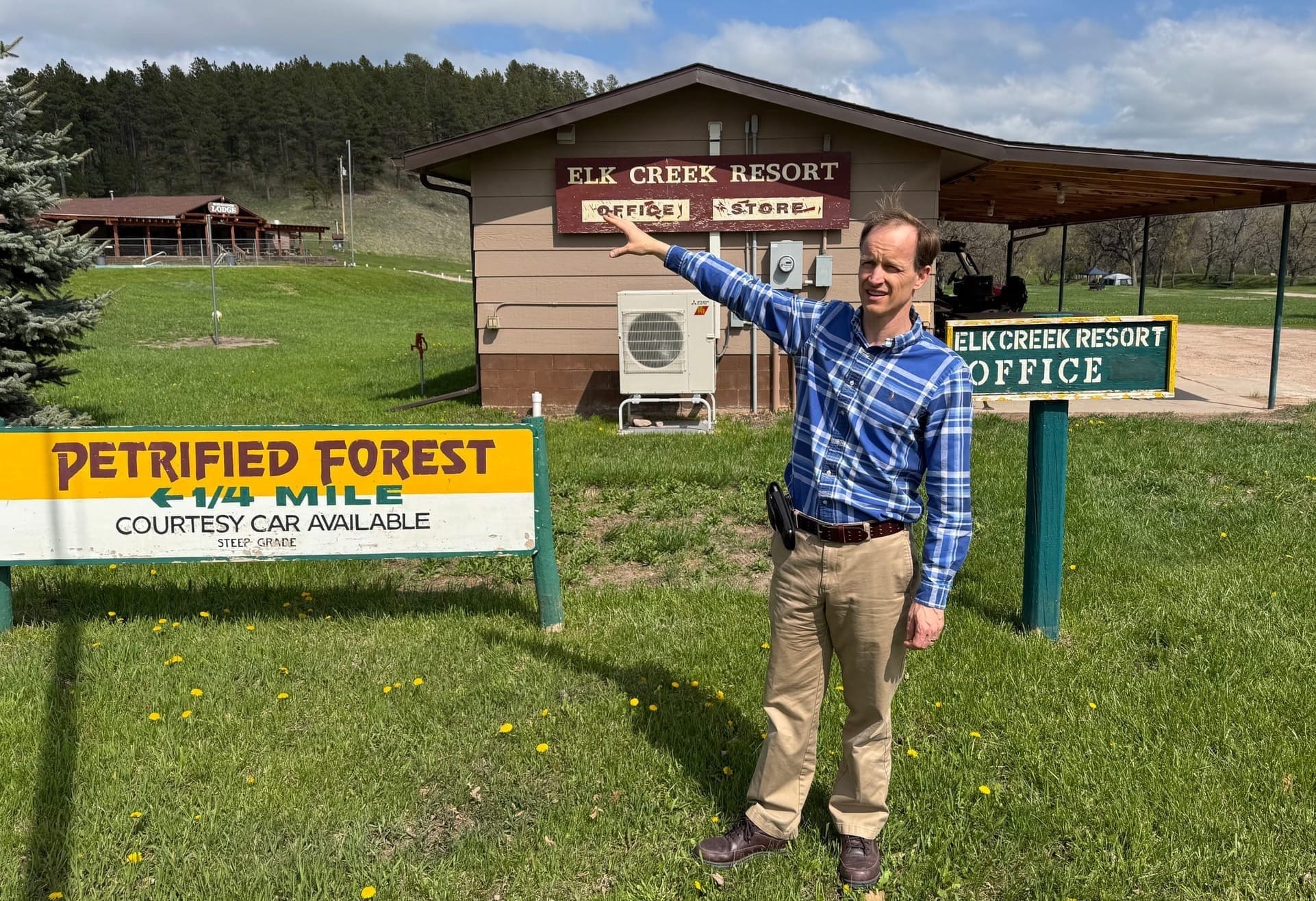 John Carley, manager of the Elk Creek Resort and Petrified Forest, points to the location of attractions within the park in Piedmont, S.D.,