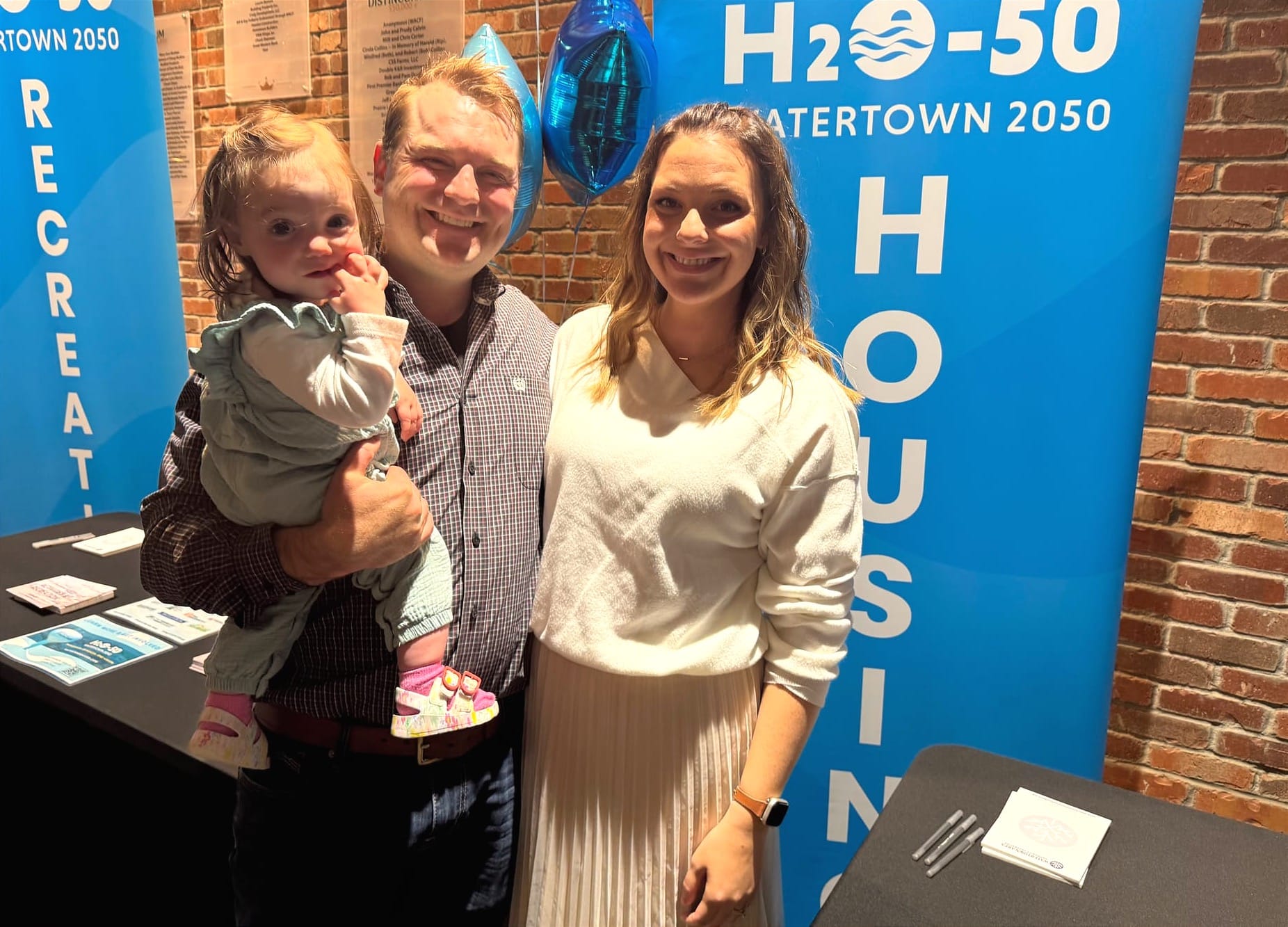 Watertown, S.D., residents Liam Culhane and his wife, Amanda Culhane, pose for a photo at the H20-50 event.