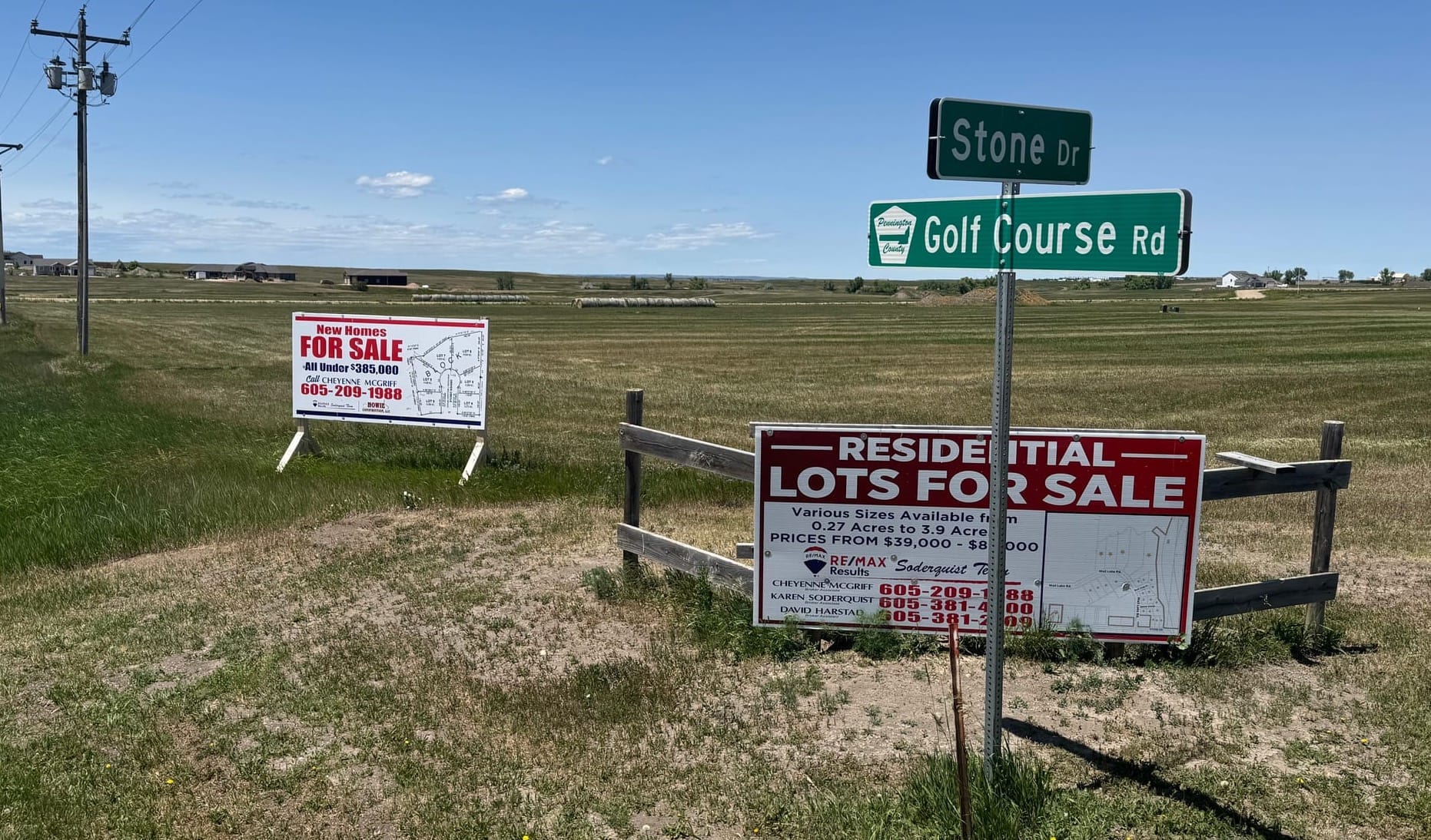 Residential lots for sale signs outside of Wall, South Dakota.