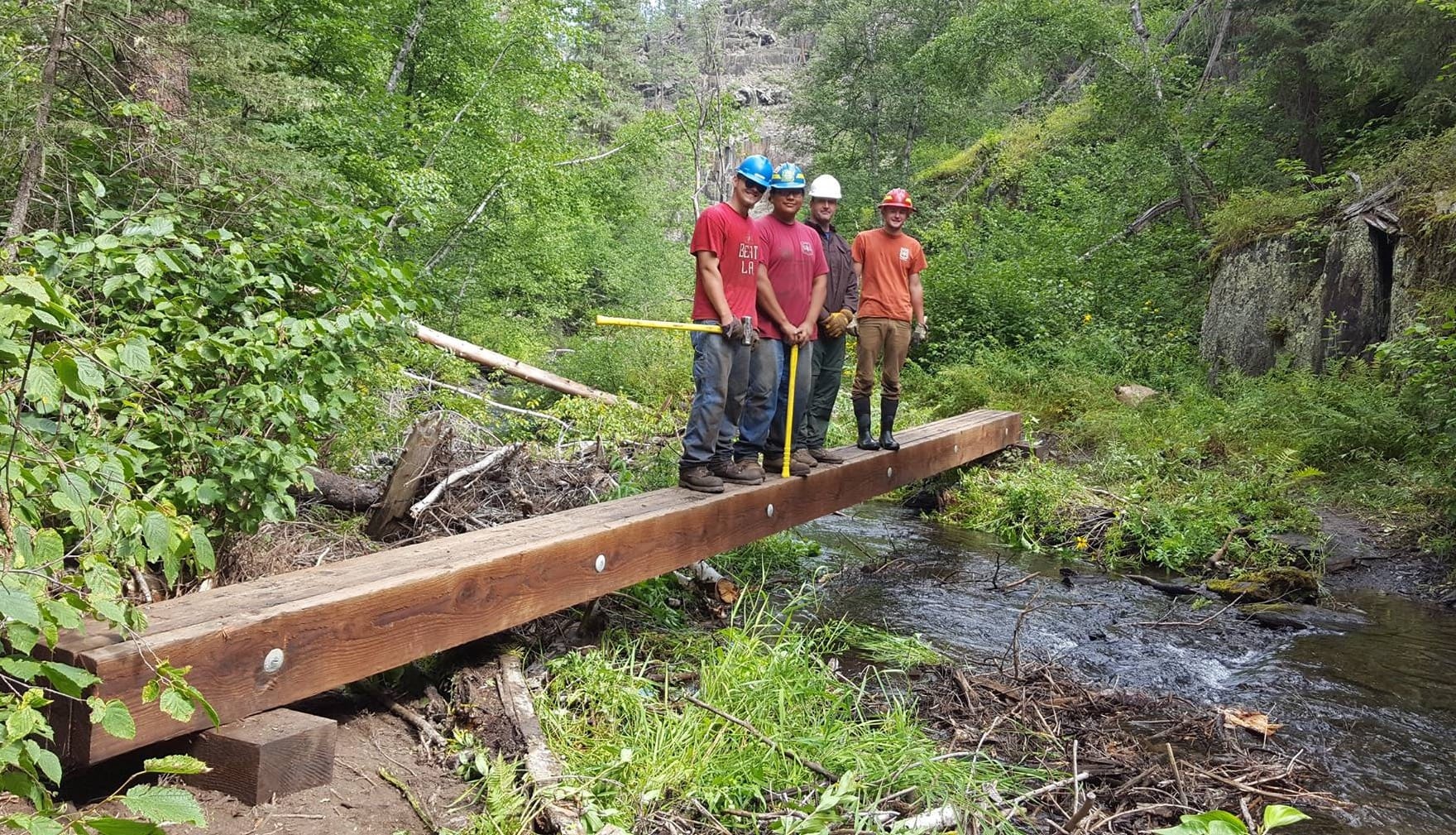 Students from the Boxelder Job Corps center in Nemo, S.D., helped clear trails and replace damaged footbridges after a bad storm in the Black Hills National Forest in 2017.