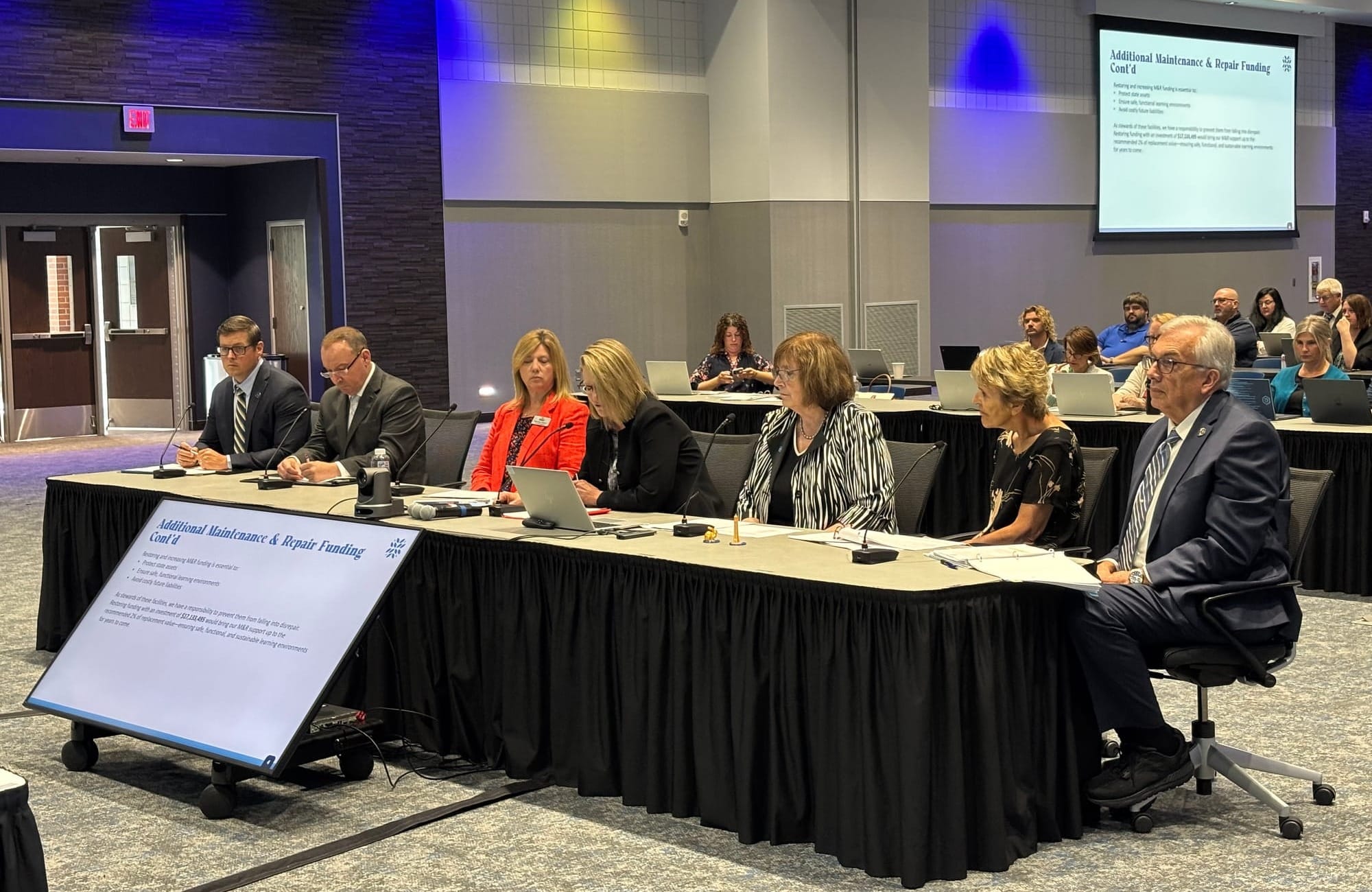 The presidents of South Dakota's public universities sit at a table.