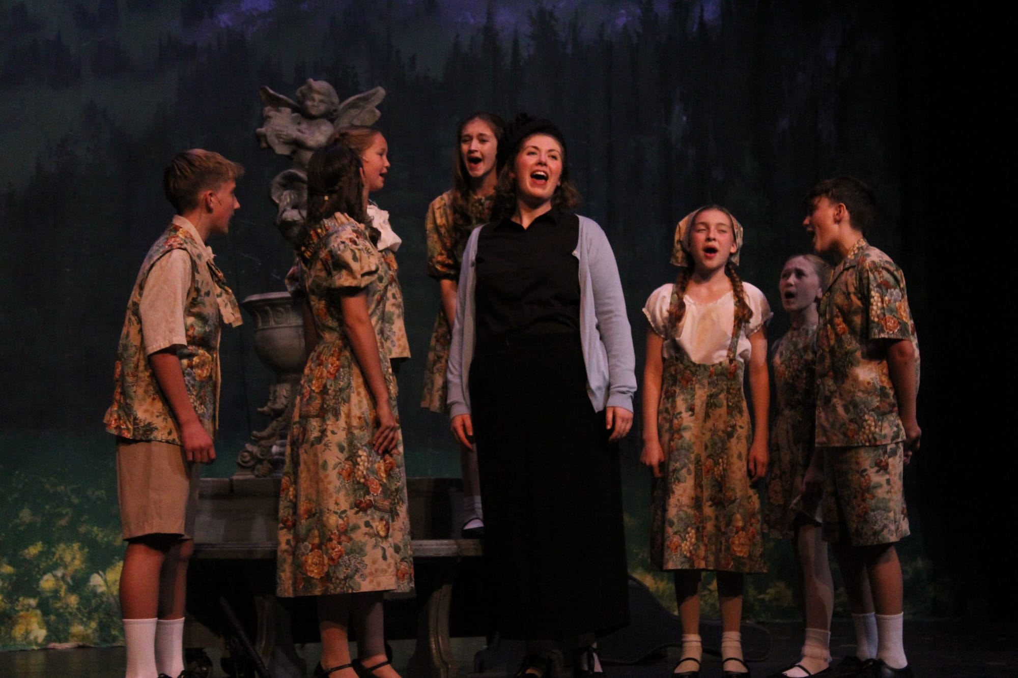 Hannah Gasperich (center) performs as Maria Rainer in the Aberdeen Community Theater's production of the "Sound of Music" in October 2025