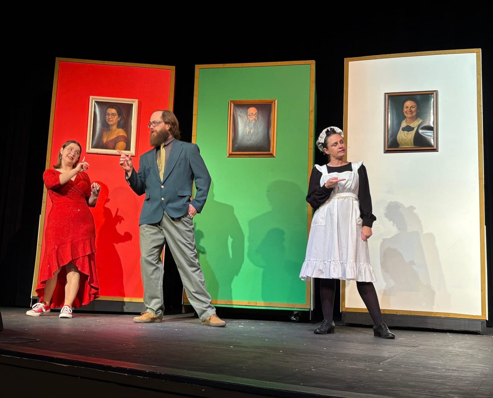 From left: Emmy Schwab as Miss Scarlet, Chris Hiles as Mr. Green and Shannun Vander Wal as Mrs. White in the Mitchell Area Community Theater's performance of "Clue" 