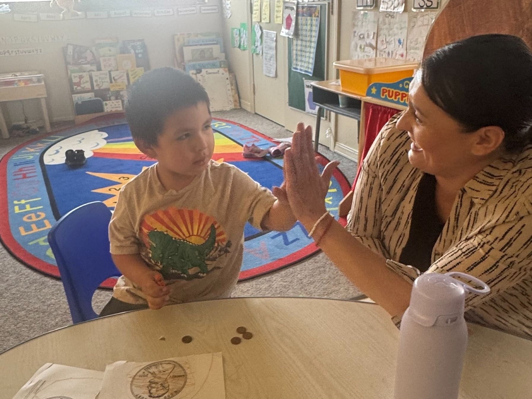Education programming leader Nicole Pourier with a student in the FACE program at Little Wound high school in Kyle, S.D. (Photo: Nicole Pourier)