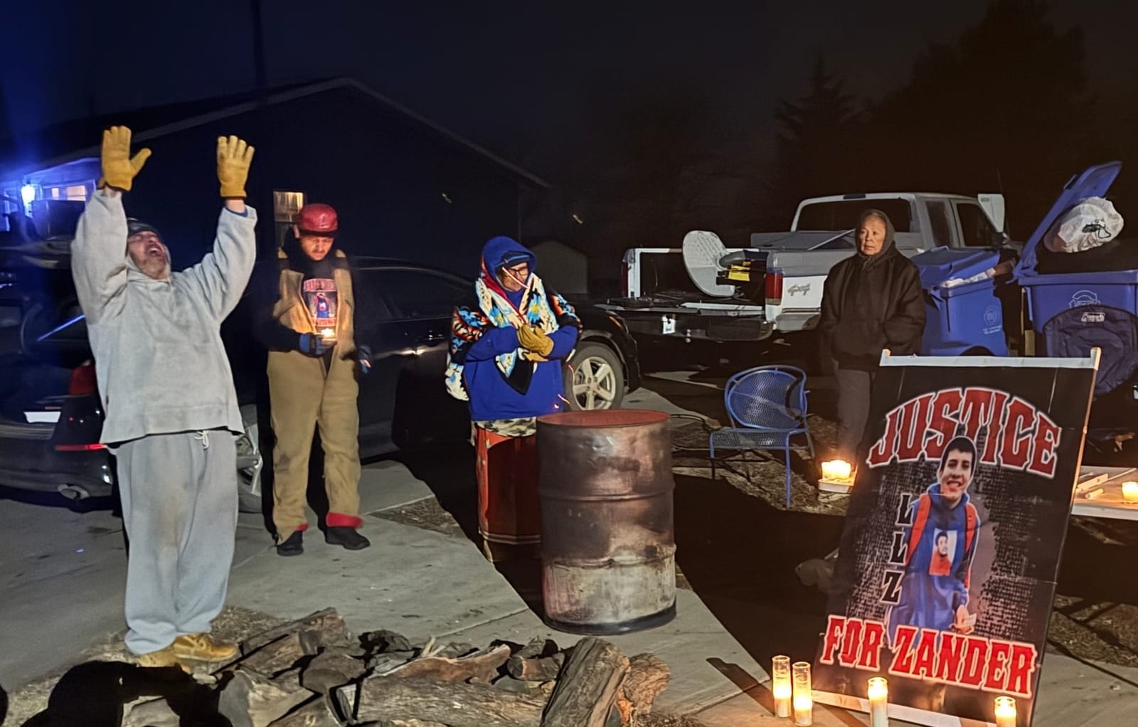 Robin Bair (left) of the Yankton Sioux Tribe sings a calling song at a candlelight vigil held Dec. 11, 2024, for Zander Zephier in the tribal community just north of Wagner, S.D.Robin Bair (left) of the Yankton Sioux Tribe sings a calling song at a candlelight vigil held Dec. 11, 2024,