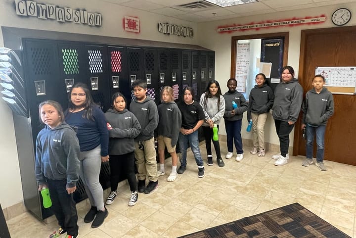 Native American students line up for recess at Sapa Un Jesuit Academy in St. Francis, South Dakota.