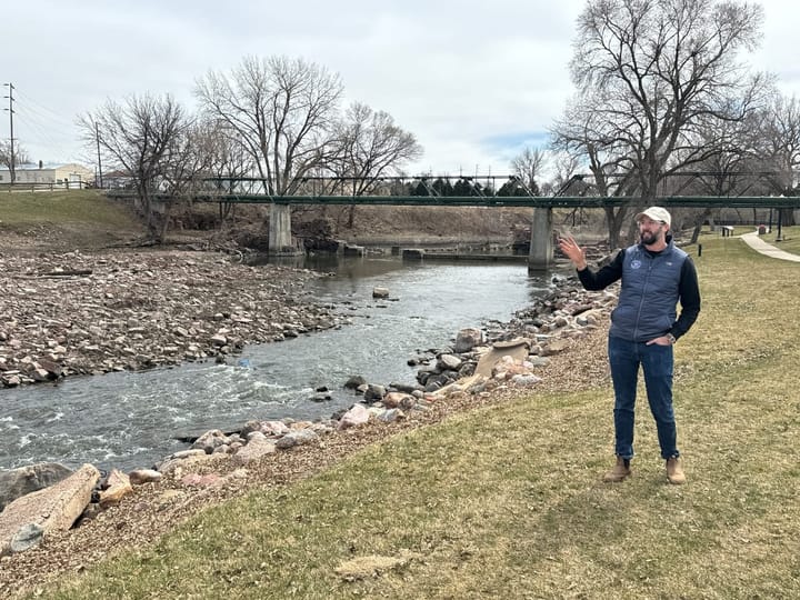 Travis Entenman stands next to the Big Sioux River in Sioux Falls, South Dakota