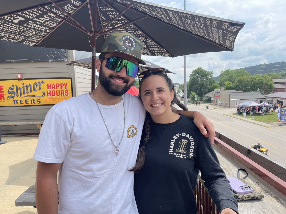 Brother and sister Nathan Tower, 24, and Kaleigh Decknick pose for a photo at the Sturgis Motorcycle Rally.