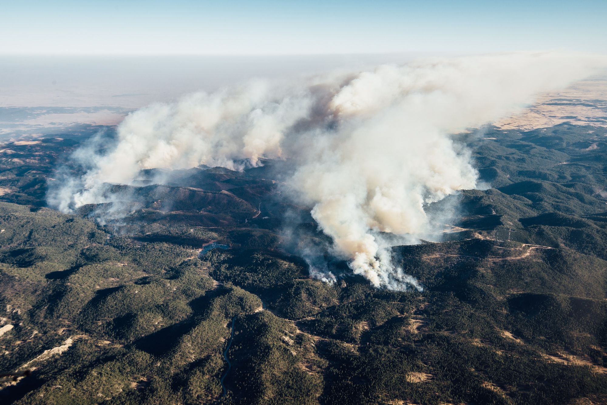 Aerial view of smoke from the fires in the hills below.