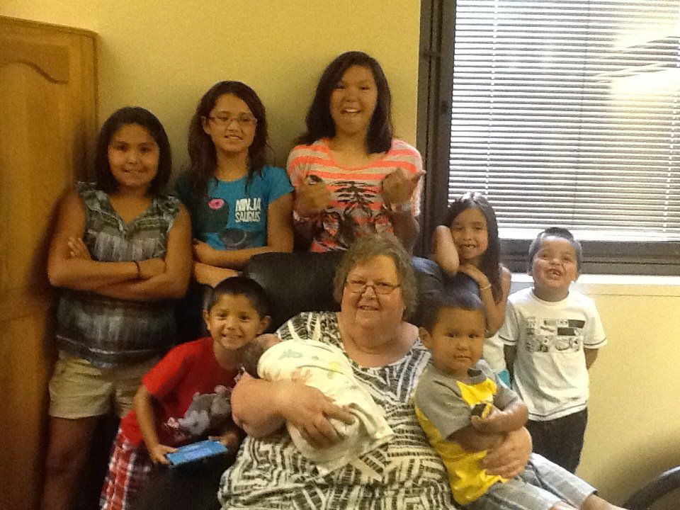 Marcella Yellow Hawk with grandchildren